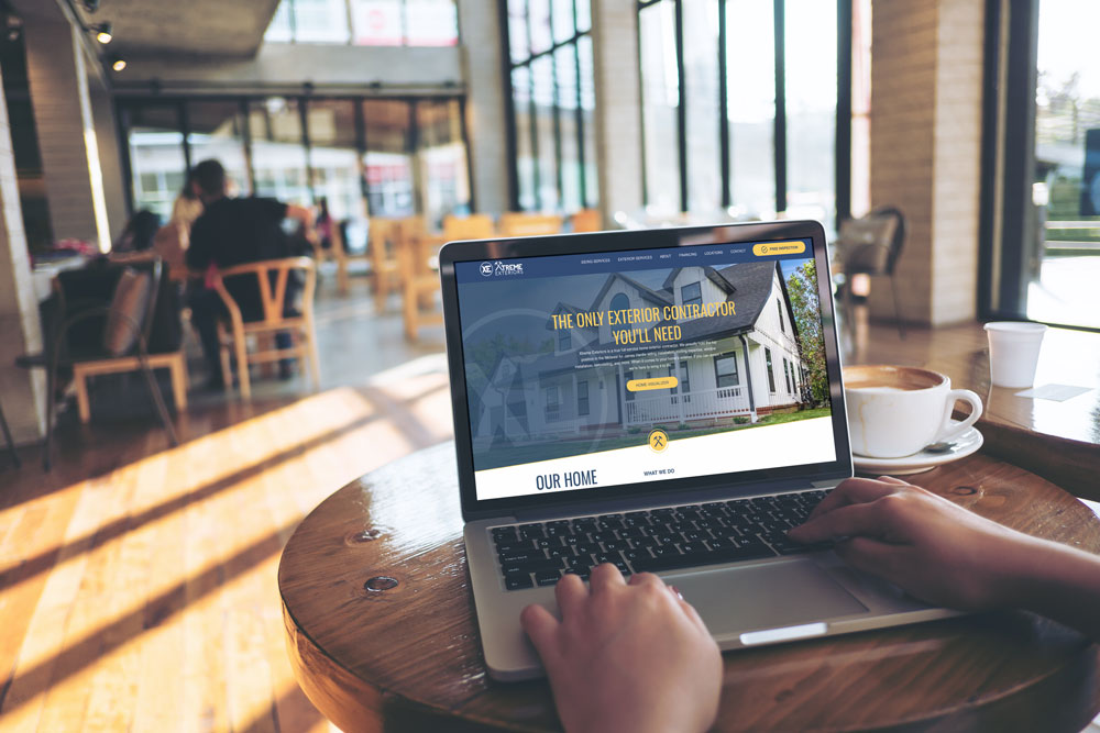 Customers using laptop to review contractor website performance for SEO strategy case study by Elevation Marketing