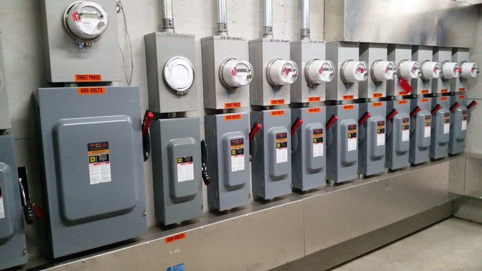 Row of electric boxes installed by a local electrician