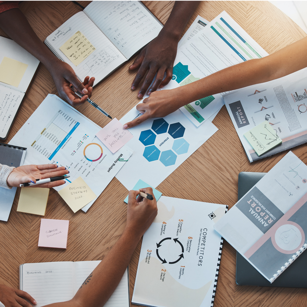 Team reviewing campaign goals and financial planning marketing expenses tax deductible for contractors strategy by Elevation Marketing