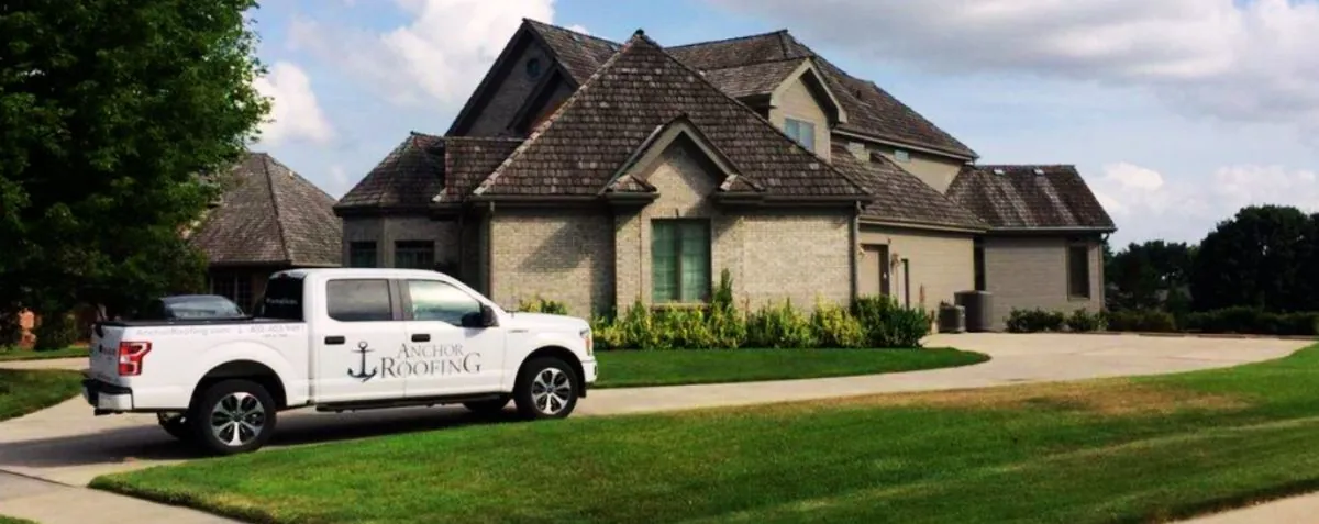roofing seo case study with truck in front of house